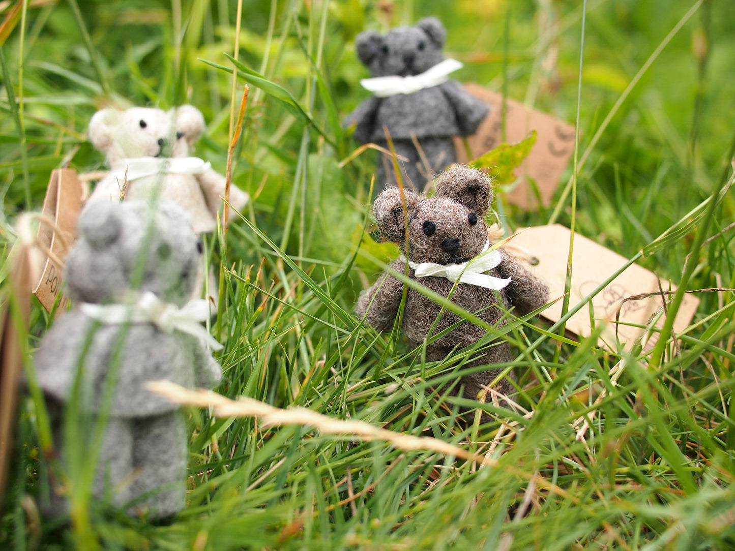 Tiny wool felt teddy bear