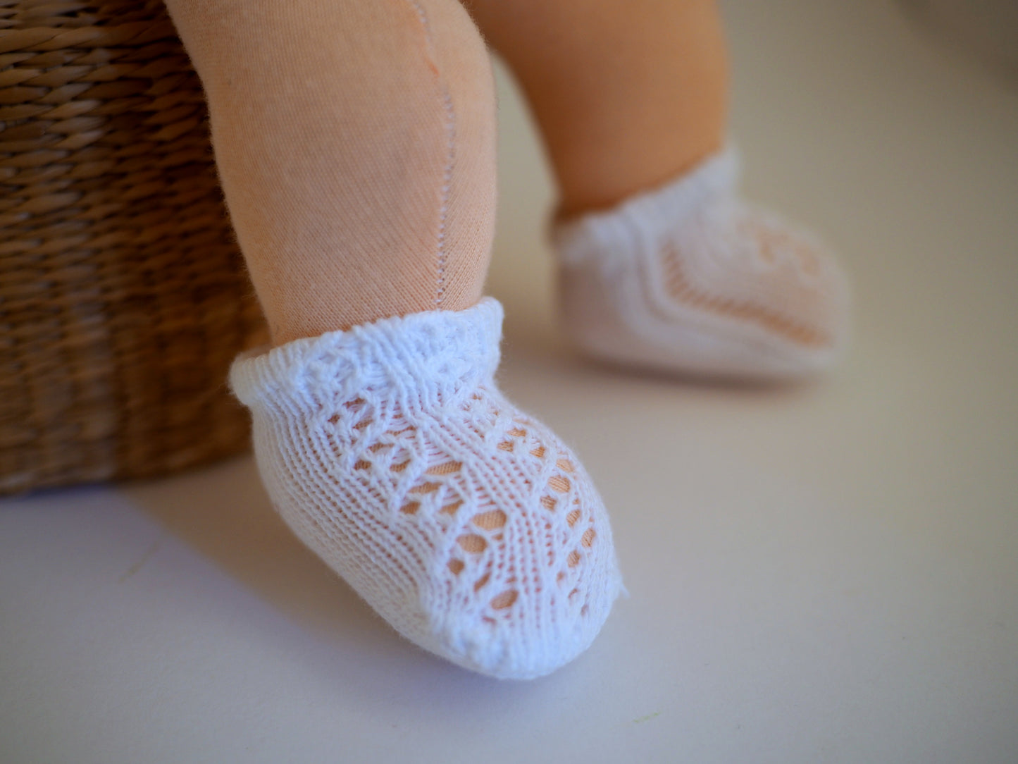 2 pairs of tights, 2 pairs of socks, and a pair of booties for my baby doll