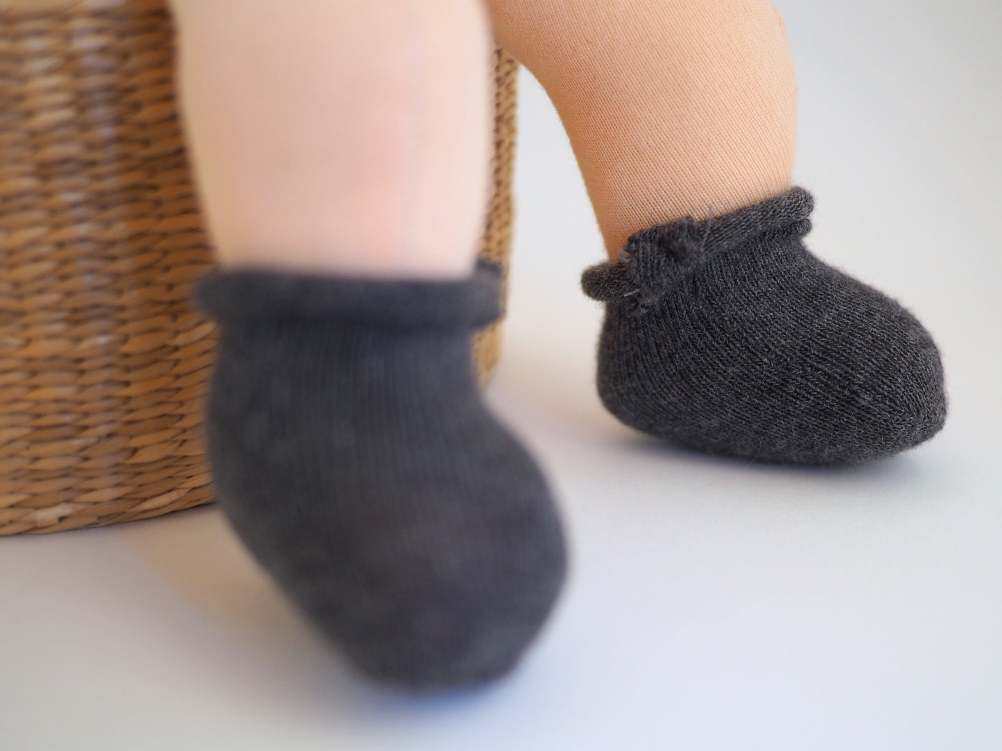 2 pairs of tights, 2 pairs of socks, and a pair of booties for my baby doll