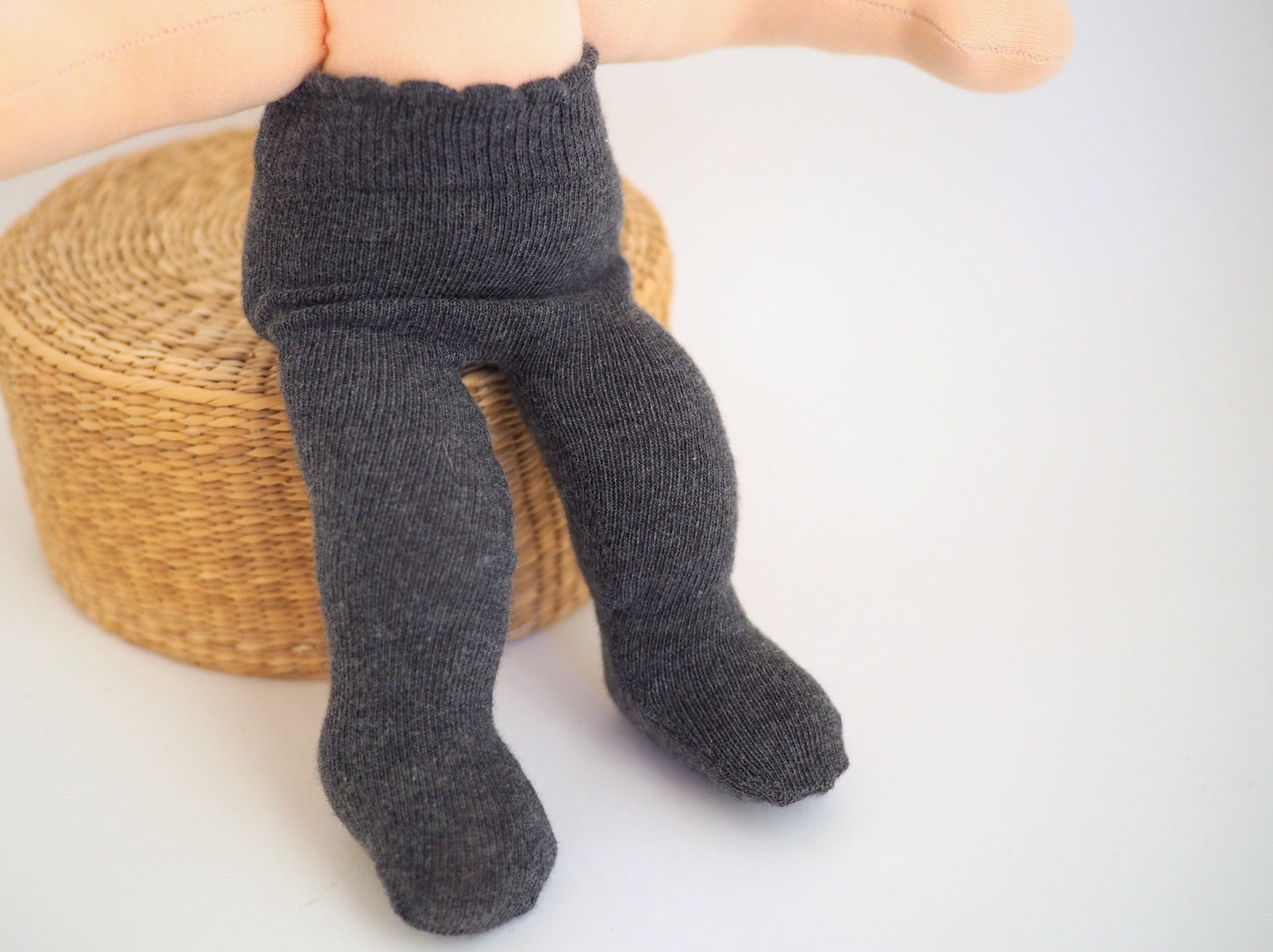 2 pairs of tights, 2 pairs of socks, and a pair of booties for my baby doll