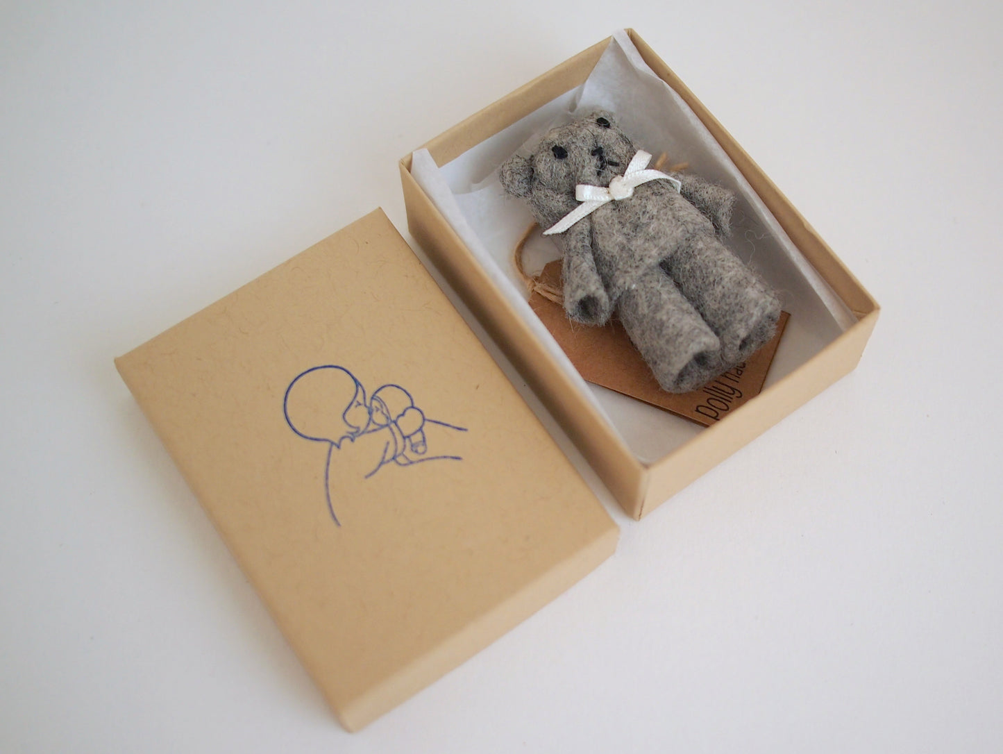 Tiny wool felt teddy bear